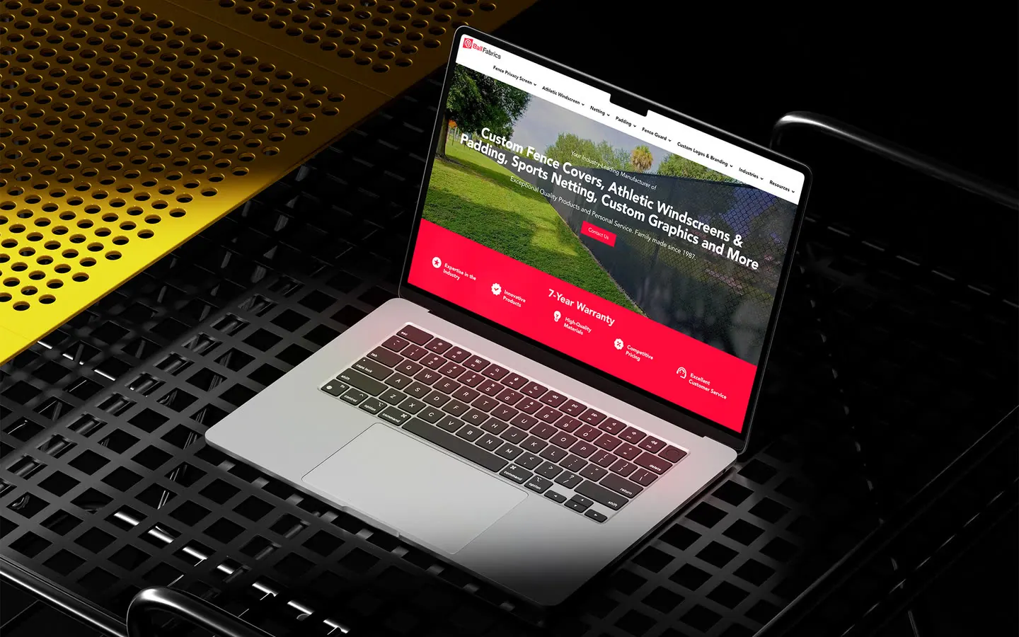 The Ball Fabrics website on a laptop