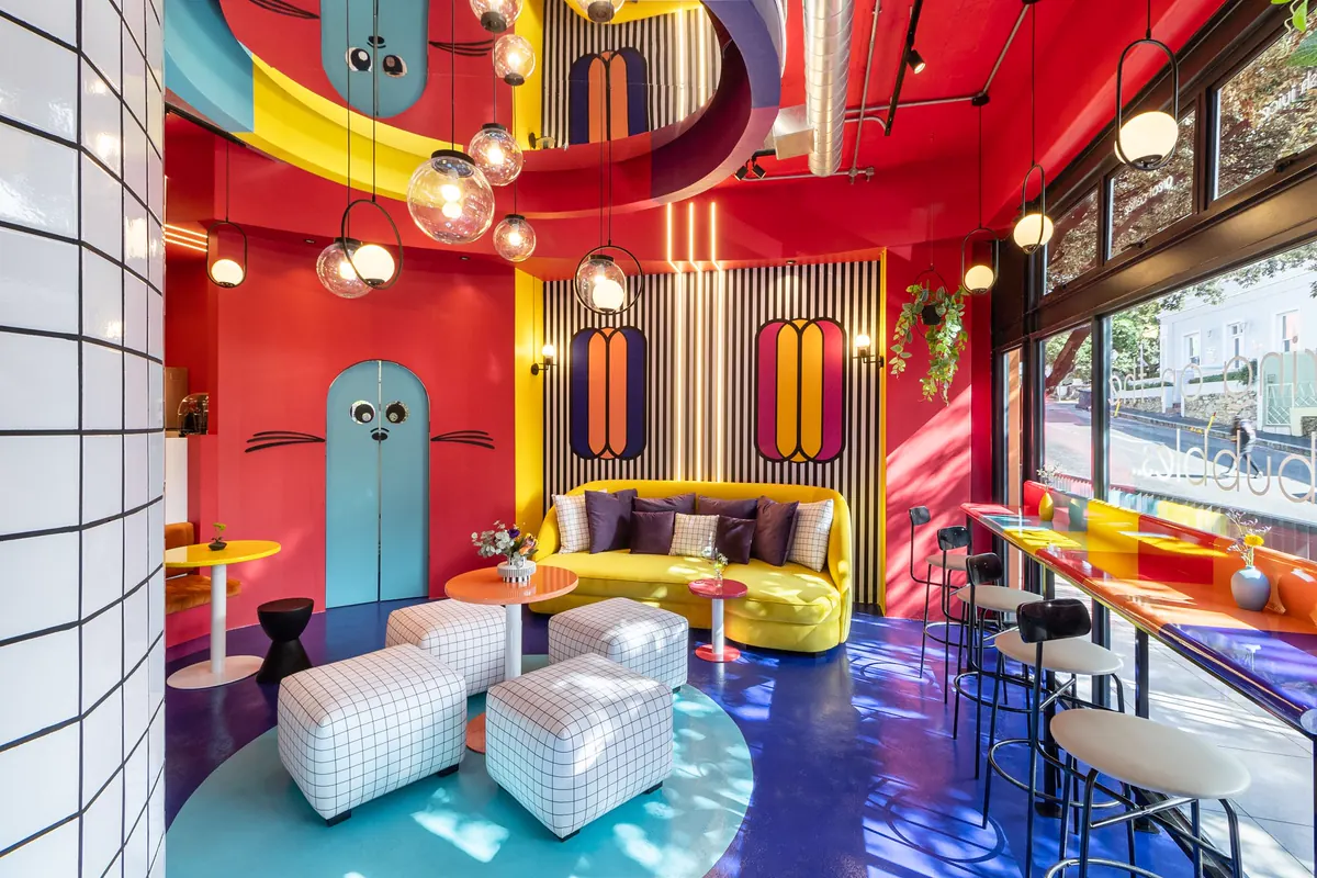 A bubble tea cafe in bold red, yellow and blue