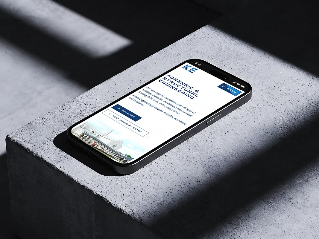 Kester Engineering's homepage on a phone: Forensic & Structural Engineering, with Services and Meet Andrew Kester