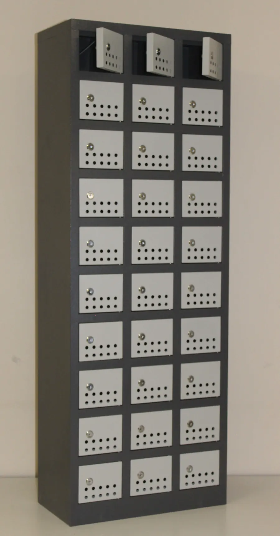 A 30-compartment steel cellphone locker